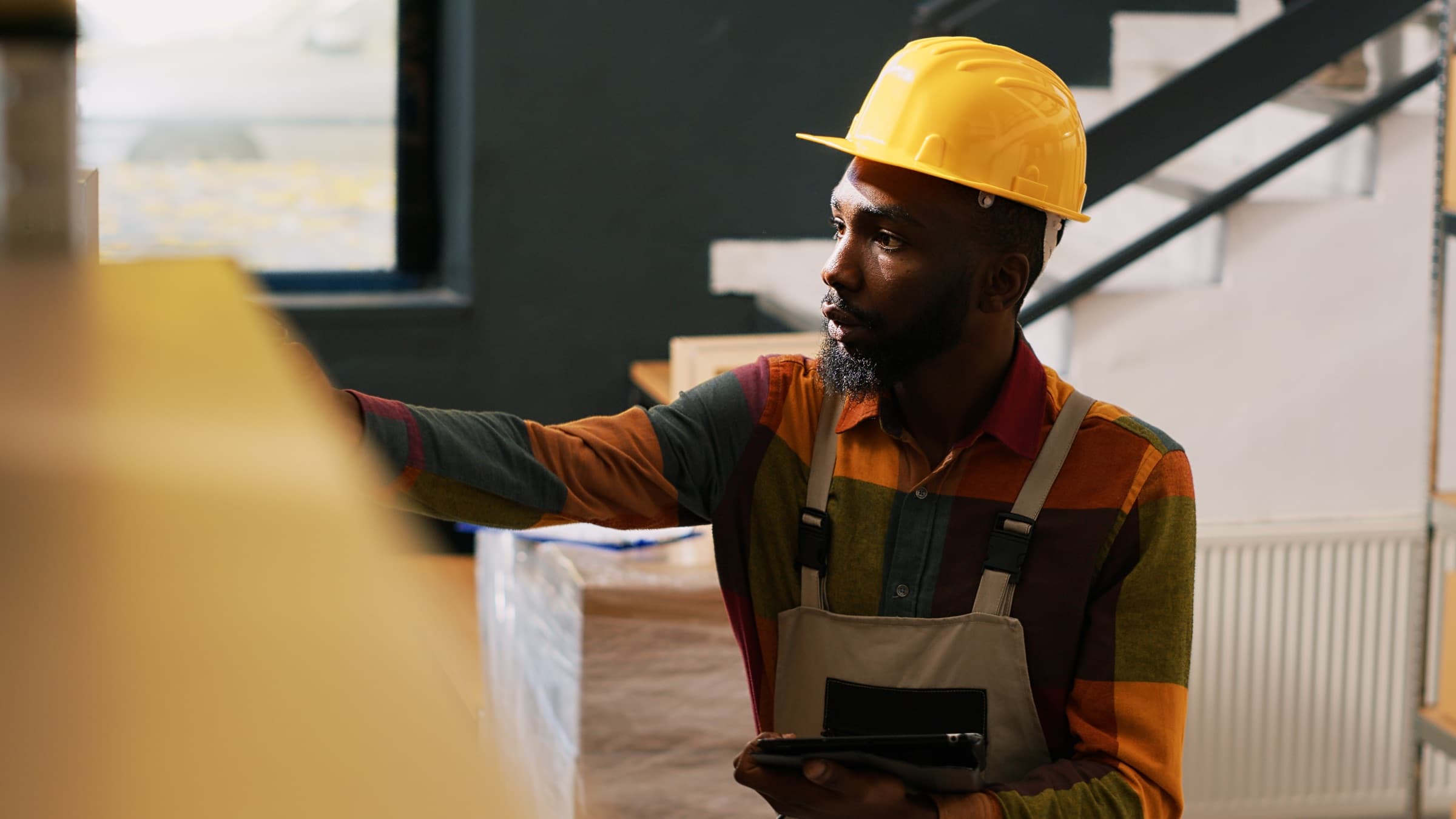 Team member reviewing stock with a barcode scanner